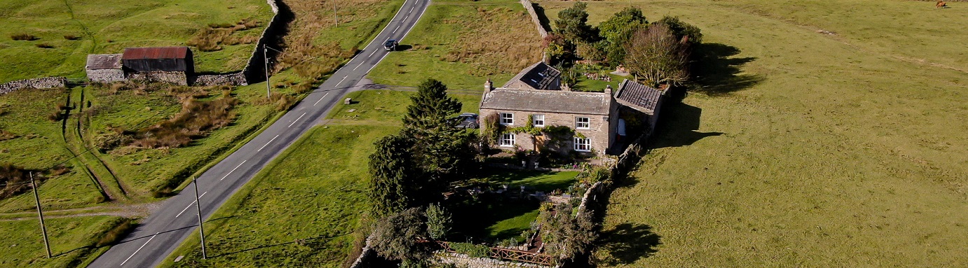 Aerial photo of a rural property and its grounds